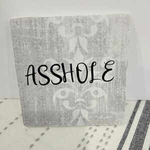 Decorative Gray and White Tile with Bold Text